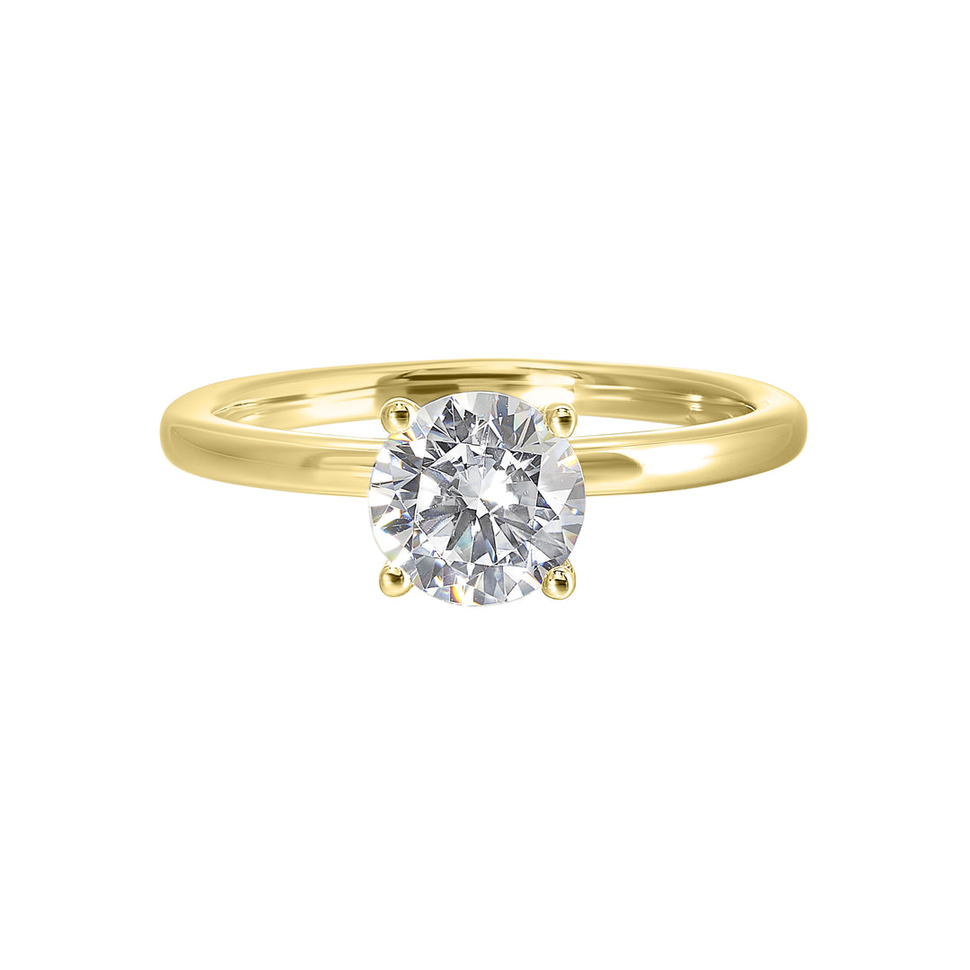 Classic elegance meets love. The round solitaire gets a upgrade with a hidden halo,  adding secret sparkle to the classic solitaire look.