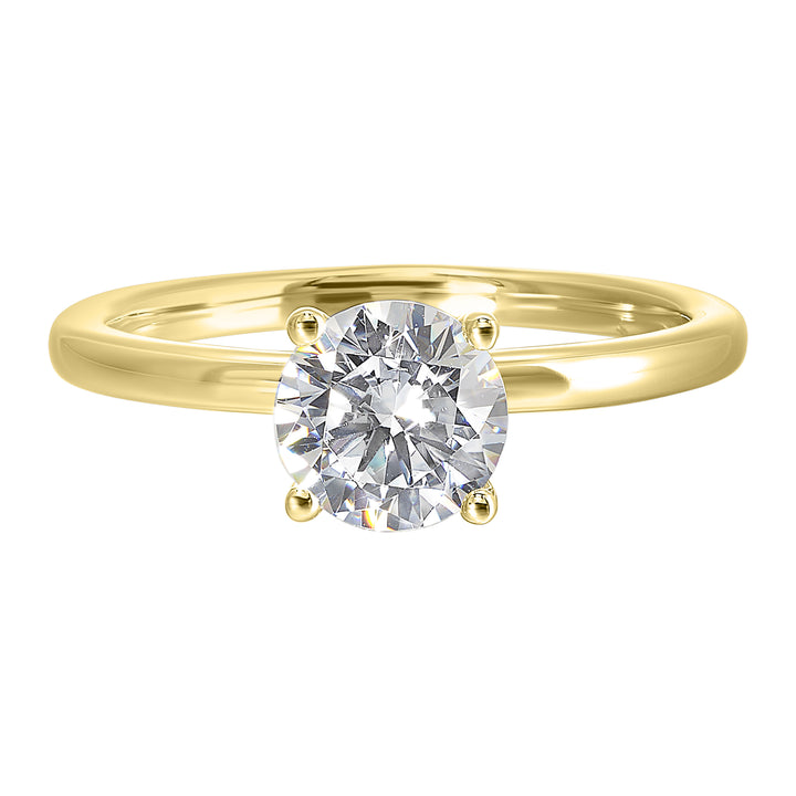 Classic elegance meets love. The round solitaire gets a upgrade with a hidden halo, adding secret sparkle to the classic solitaire look.