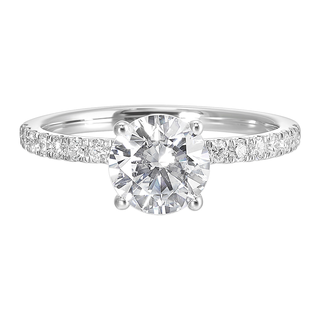 Shine from every angle with this gorgeous round solitaire hidden halo engagement ring. This timeless design offers elegance making it everlasting symbol of your love.