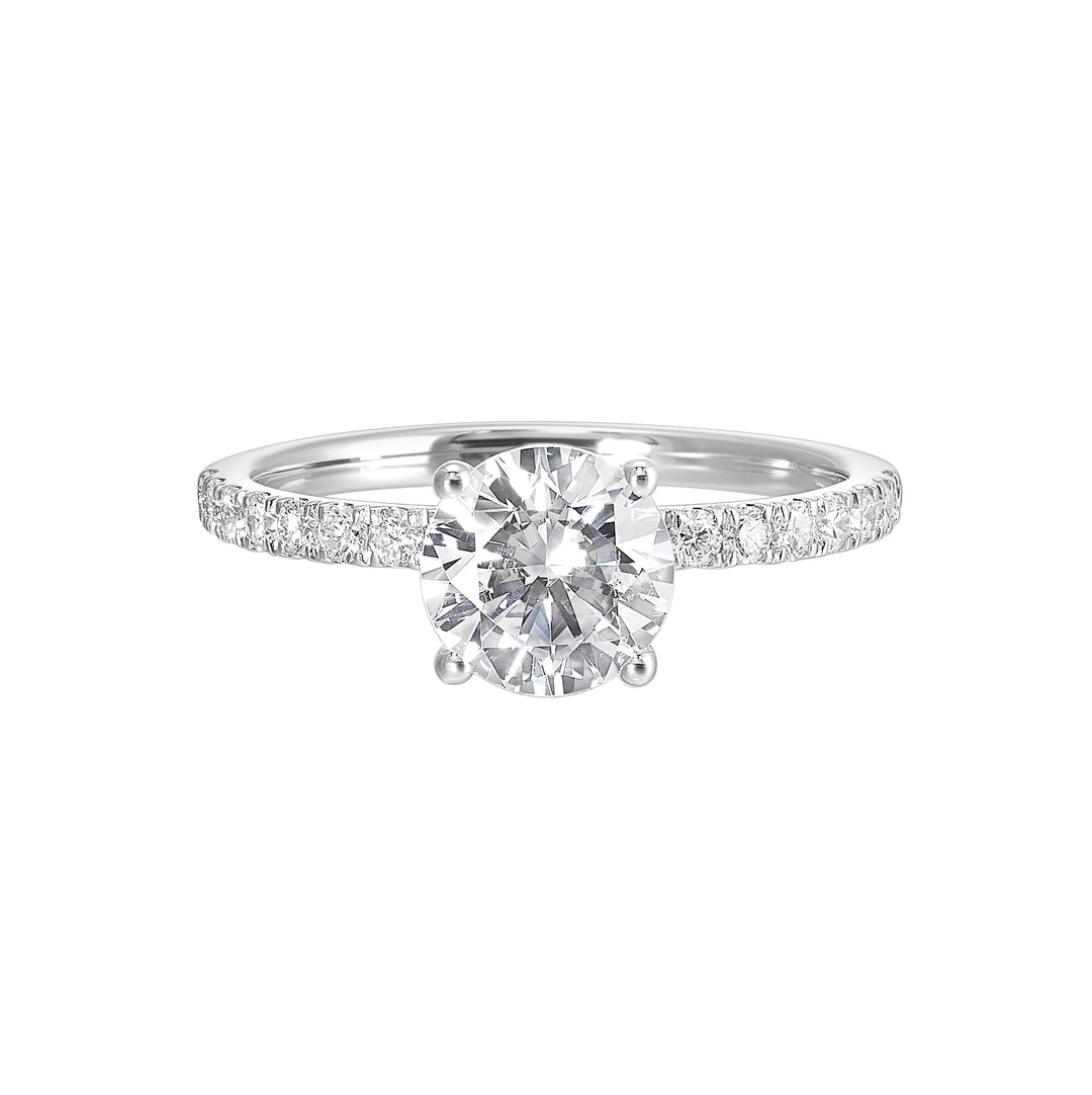 Shine from every angle with this gorgeous round solitaire hidden halo engagement ring. This timeless design offers elegance making it everlasting symbol of your love.