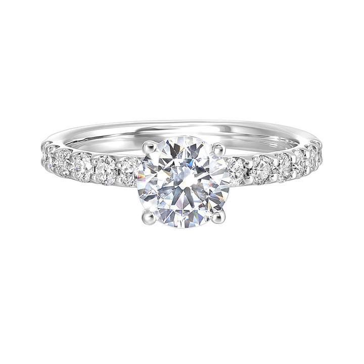 A solitaire ring sparkles further with diamond studded shank displaying timeless elegance and dazzling brilliance is a classic choice.