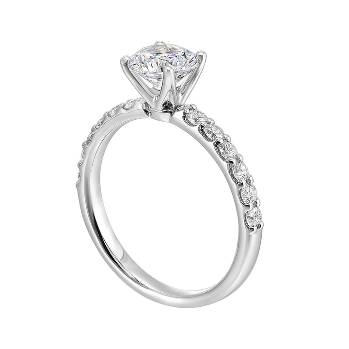 A solitaire ring sparkles further with diamond studded shank displaying timeless elegance and dazzling brilliance is a classic choice.