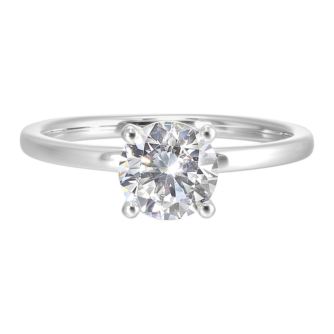 The dazzling solitaire diamond take center stage. The petite band adds to the sleek, classic look.