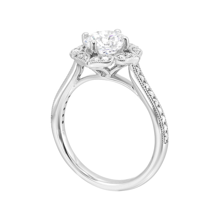 The solitaire ring gets a upgrade with a floral halo and diamond studded shank making your love blossom forever.