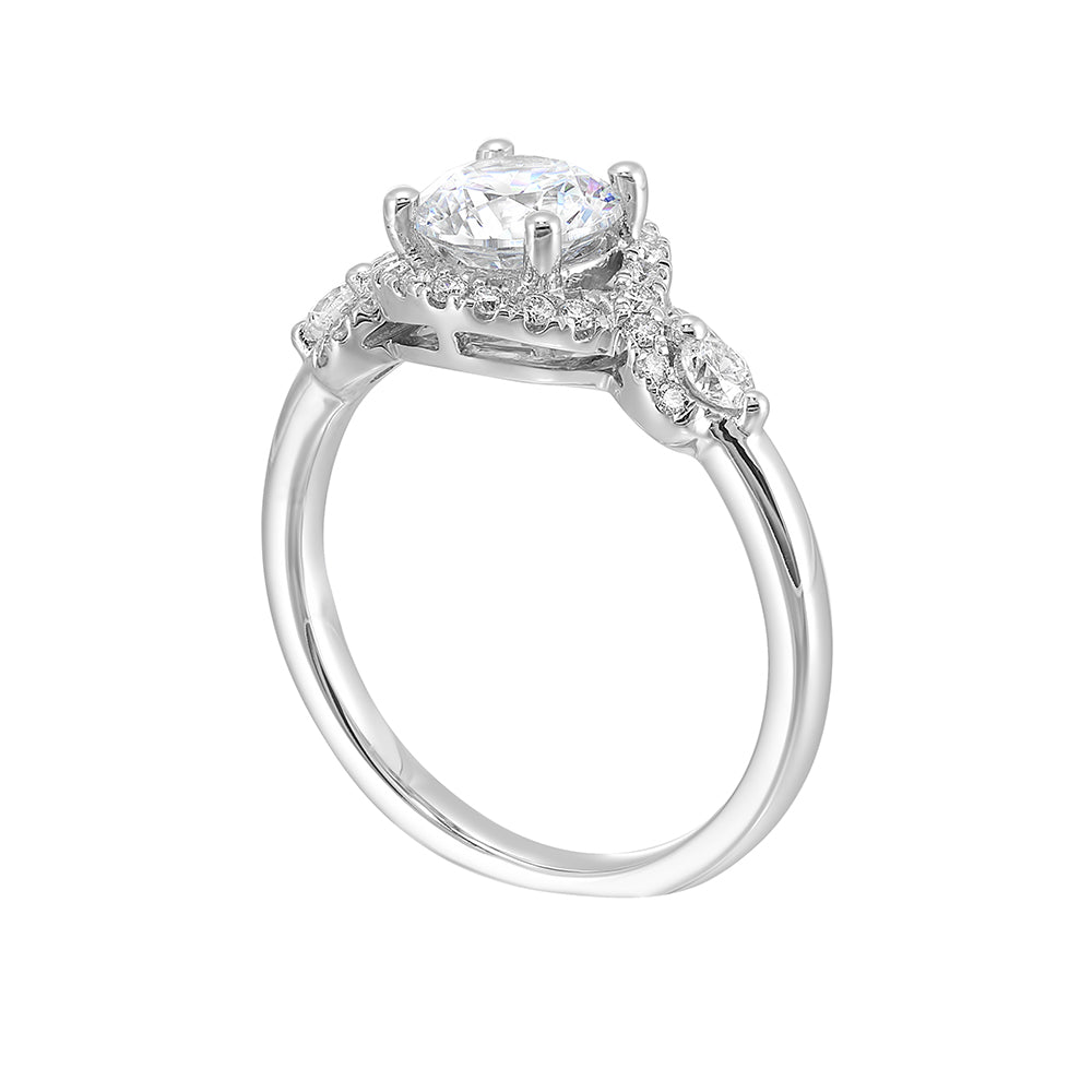 Encircling the base of solitare center with pave of glittering diamonds this three stone ring is sure to enchant her.