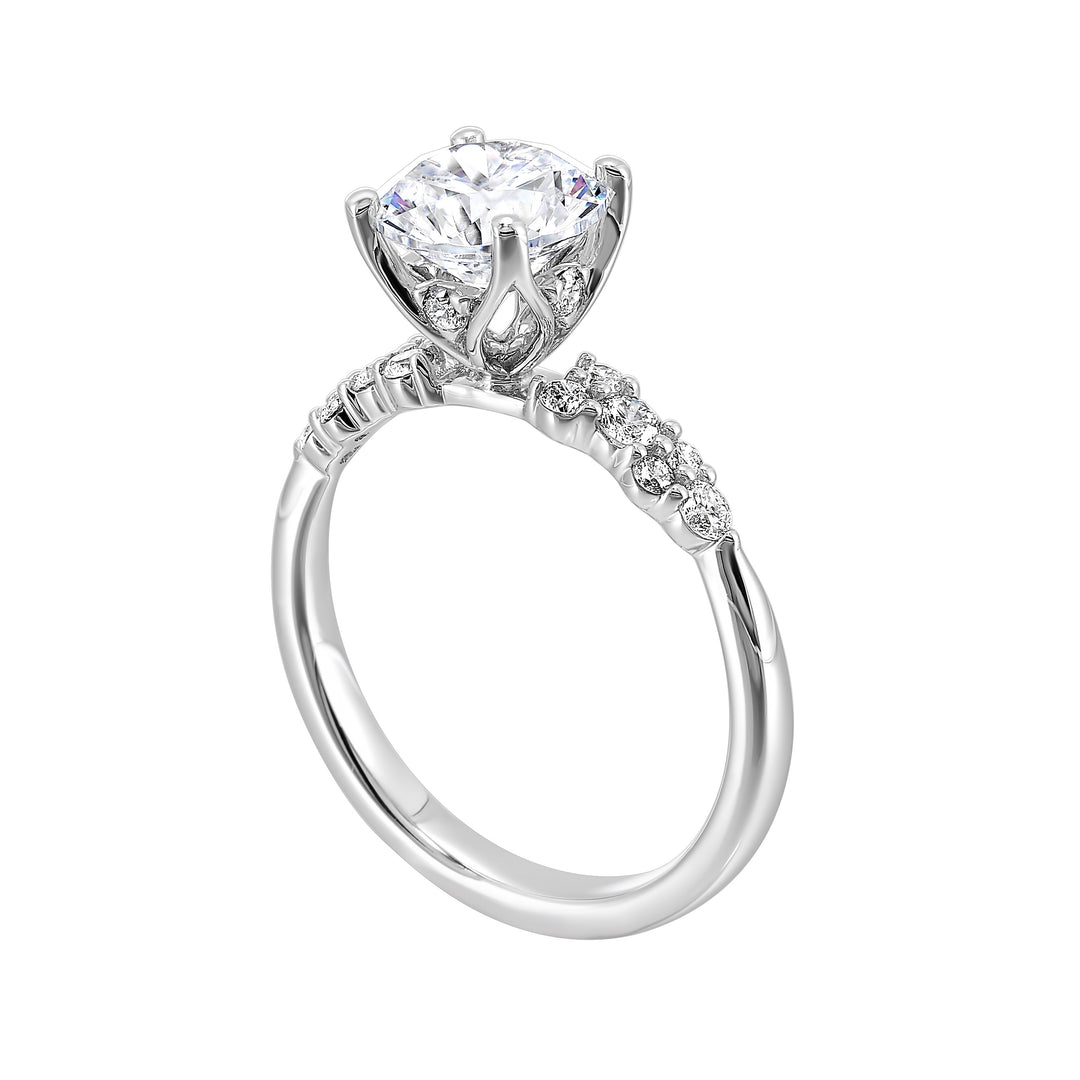 Glamorous solitare engagement ring dazzles with round diamonds set in lustrous pattern.