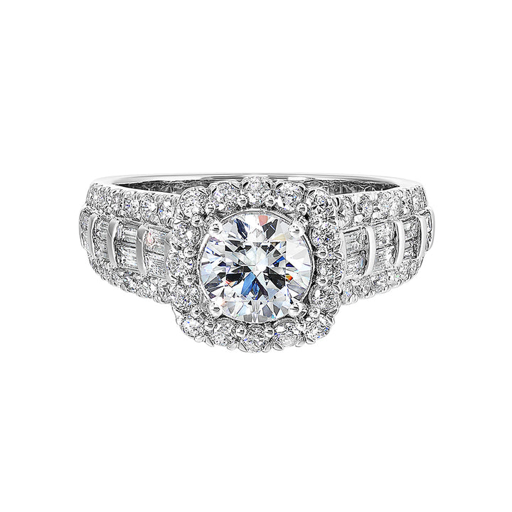 This modern style engagement ring features three rows of pave set diamonds with baugette diamonds in the center row standing out along with a softer cushion halo.