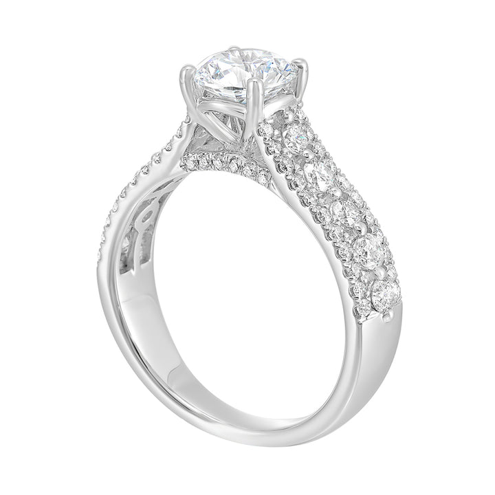 A triple row engagement ring with bigger diamond in center complemented by two micro row of diamonds on either side is perfect to sparkle your evening.