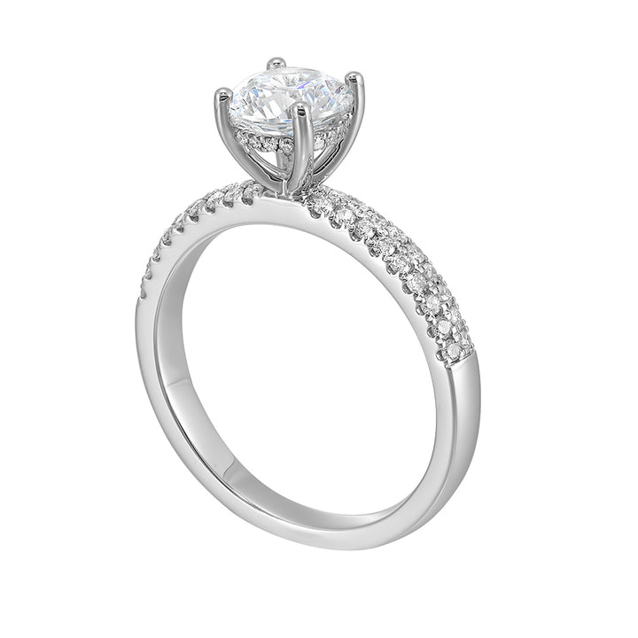 Light up with twice the sparkle with the two line micro pave band and round solitare for an eye catching look.