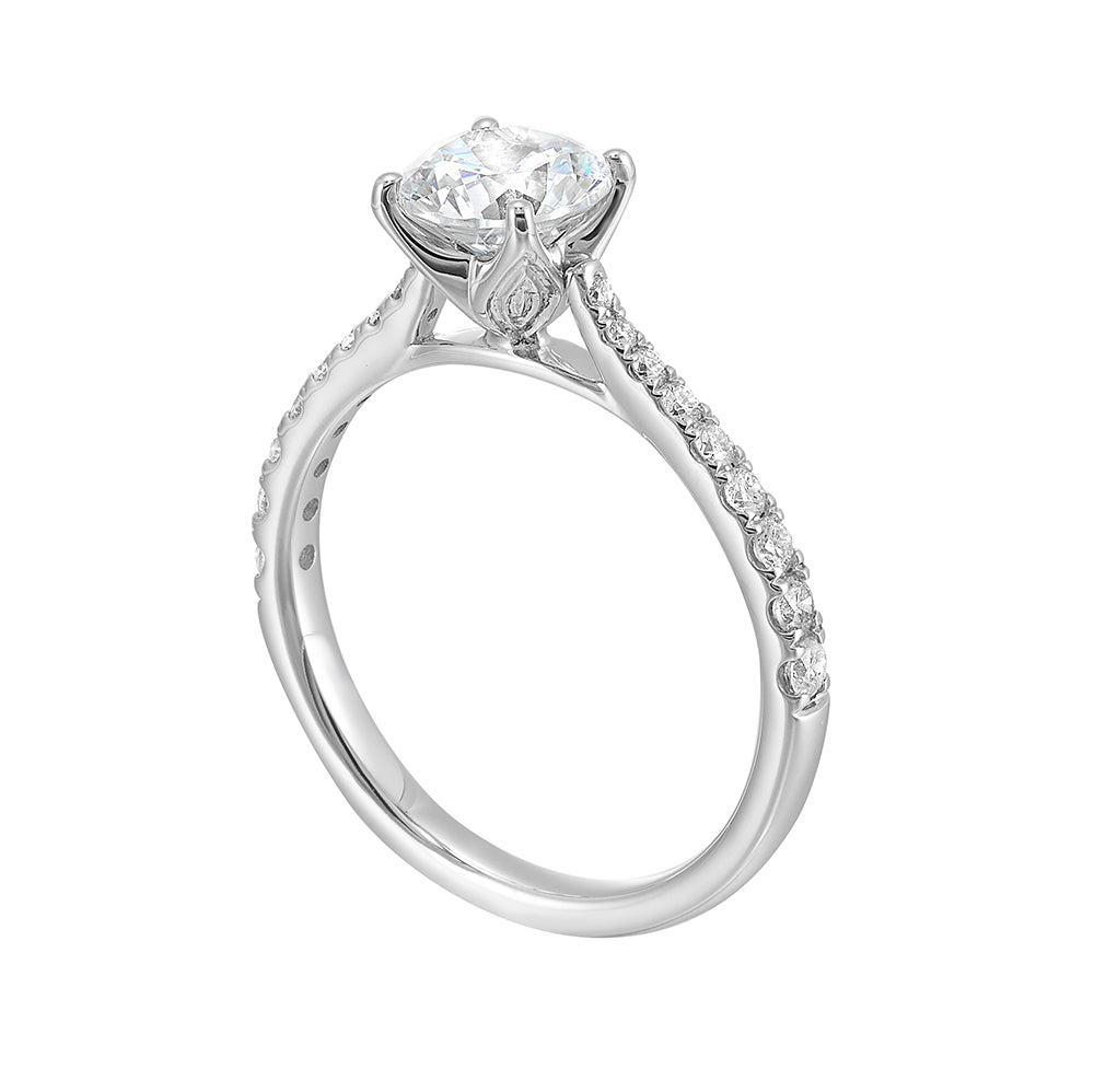 This stylish pave engagement ring features round center solitare making it a stunning choice.