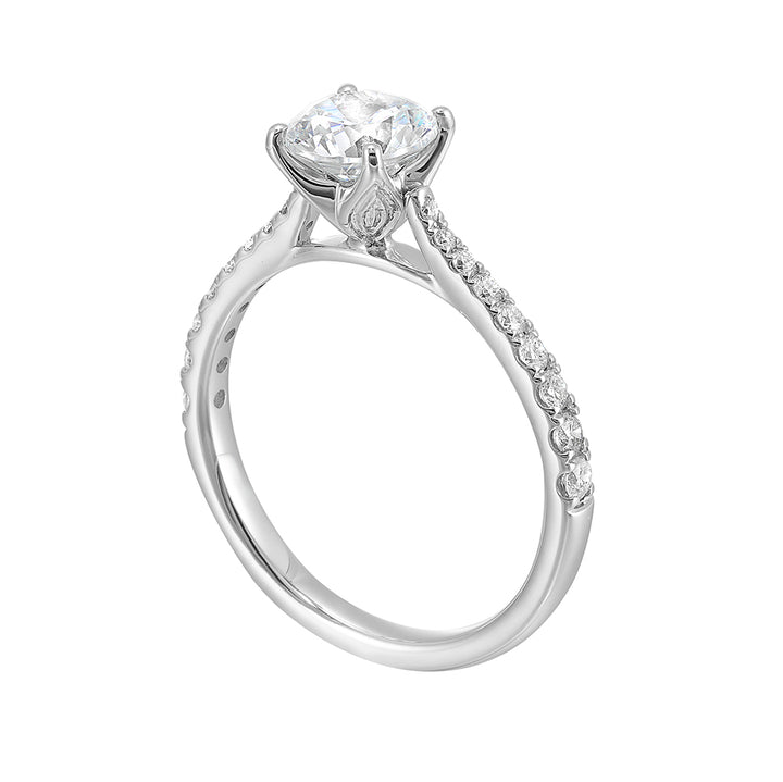 This stylish pave engagement ring features round center solitare making it a stunning choice.