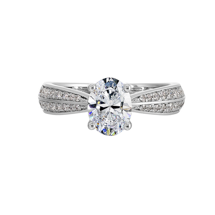 Pave set knife edge engagement ring with oval solitaire creates an elegant look with minimalist appeal.