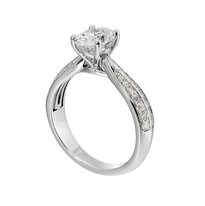 Pave set knife edge engagement ring with oval solitaire creates an elegant look with minimalist appeal.