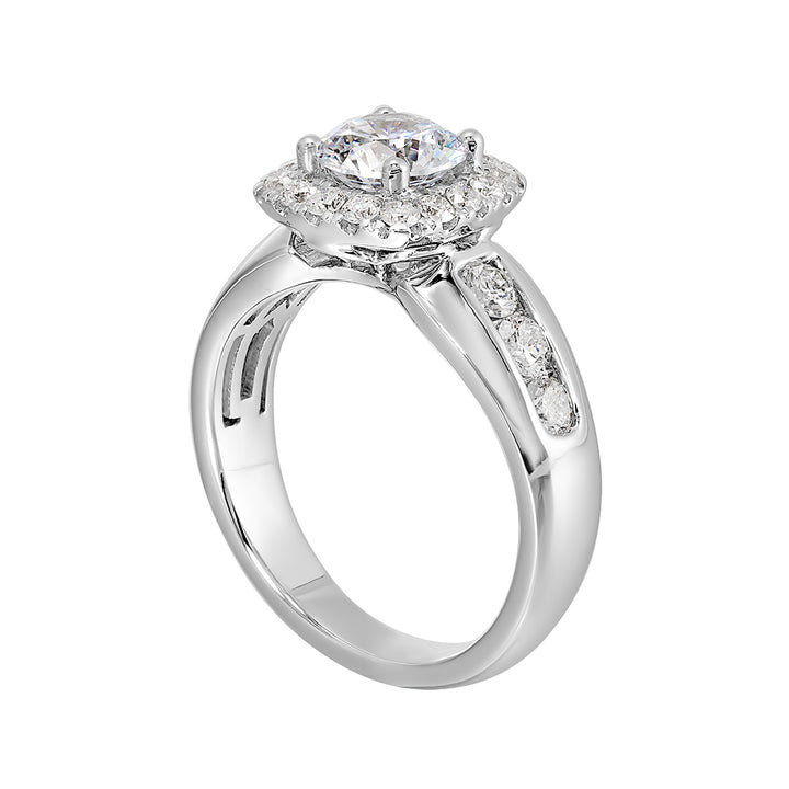 Channel set diamonds wrap this glamorous ring with an addition of cushion halo and solitaire center.