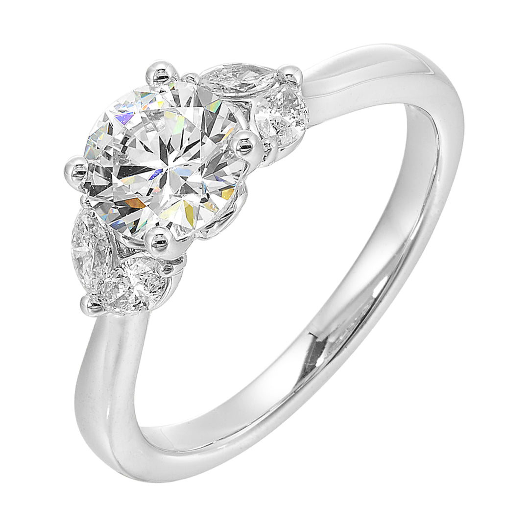 Create timeless romance with round solitaire engagement ring held between symmetrical marquise petals.