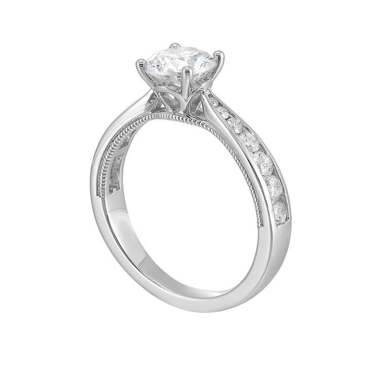 Solitaire ring complemented by pave set diamonds on pinched metallic shank with enchanting front details is sure to impress her.