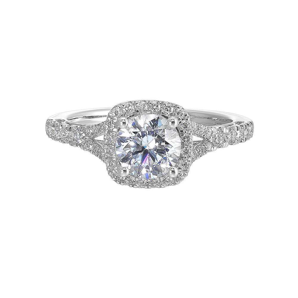 A softened cushion halo of diamonds surrounds the center solitaire with front details.Pave split shank adds a stylish,  dazzling look.