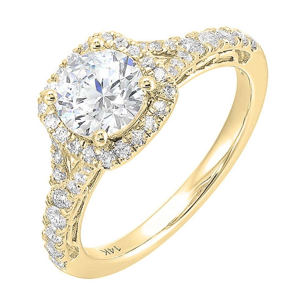 A softened cushion halo of diamonds surrounds the center solitaire with front details.Pave split shank adds a stylish, dazzling look.
