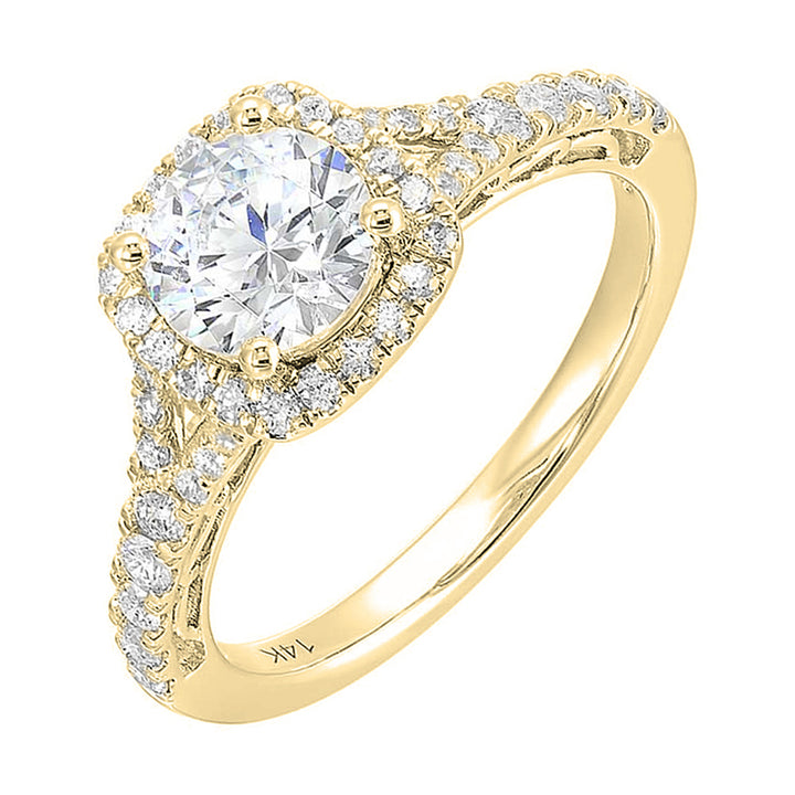 A softened cushion halo of diamonds surrounds the center solitaire with front details.Pave split shank adds a stylish, dazzling look.
