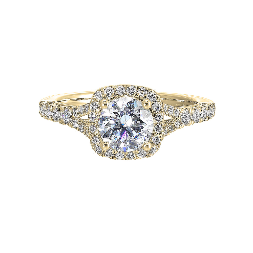 A softened cushion halo of diamonds surrounds the center solitaire with front details.Pave split shank adds a stylish,  dazzling look.