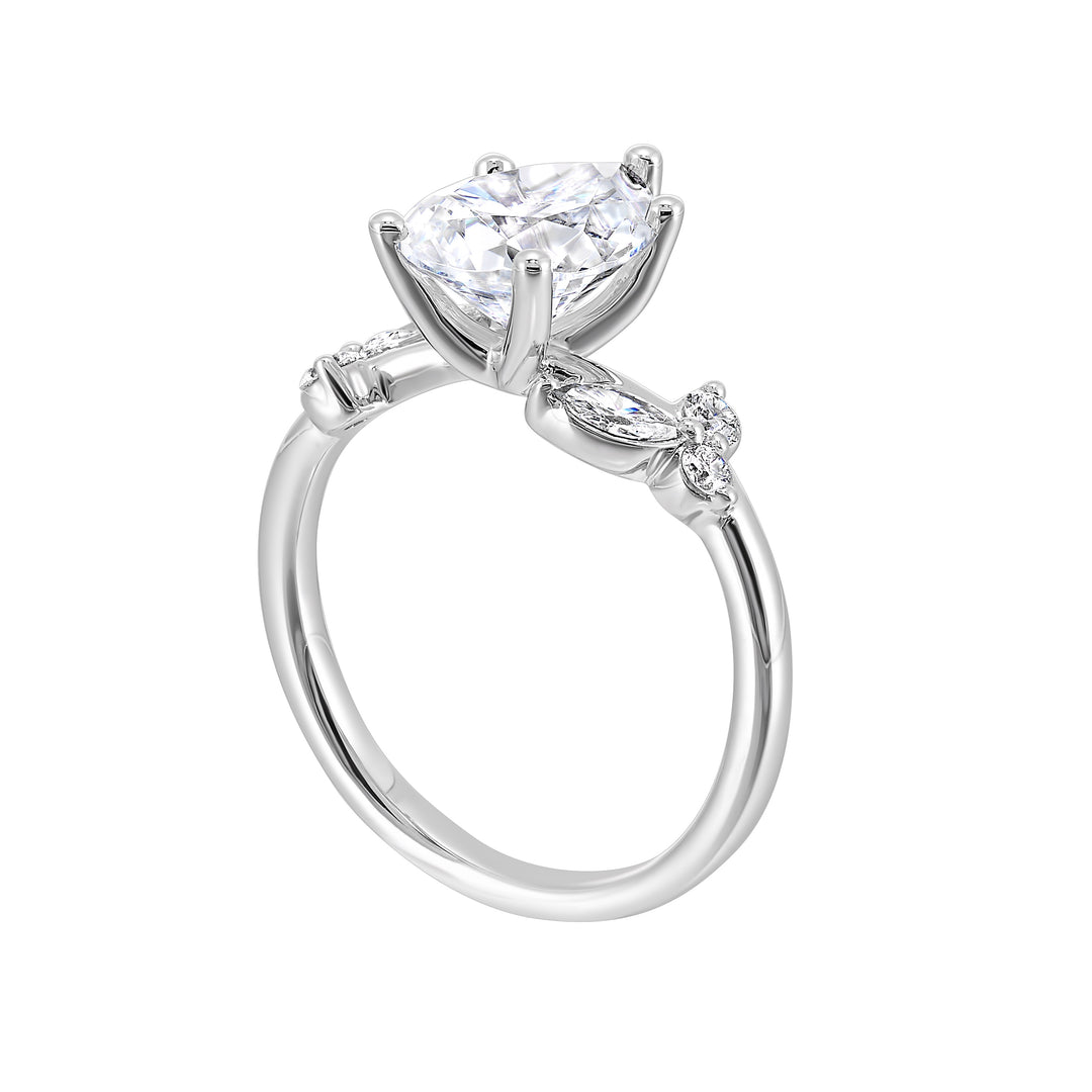 Timeless pear cut engagement ring features marquise and round diamonds placed randomly are perfect for her special day.