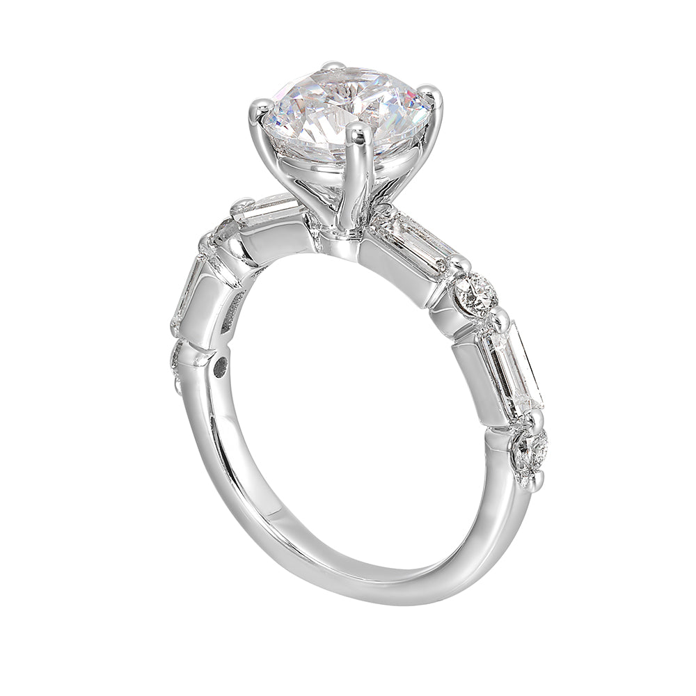 Baguettes and round diamonds spell contemporary elegance along this solitaire engagement ring.