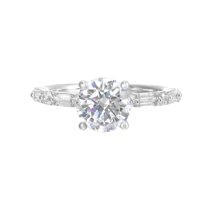 Baguette and round diamond story create a classic, elegant presentation for the round diamond center.