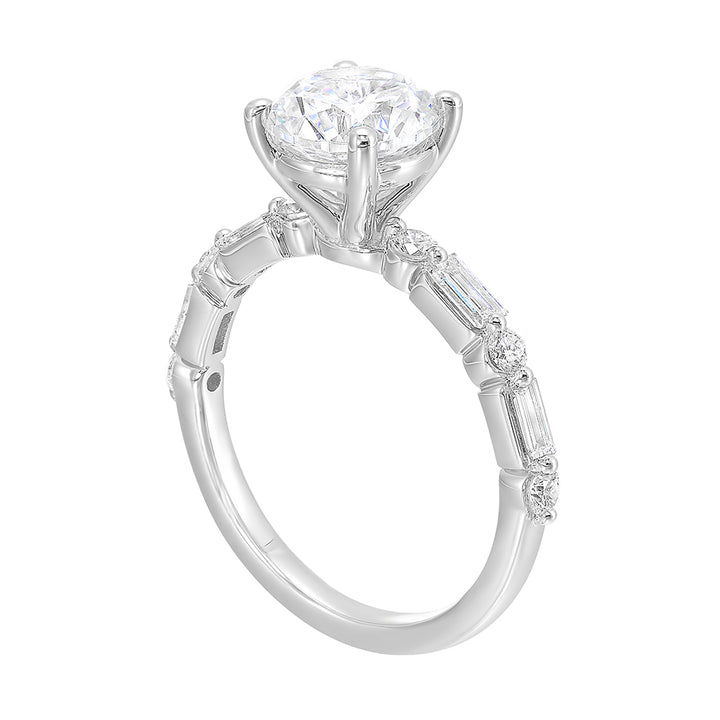 Baguette and round diamond story create a classic, elegant presentation for the round diamond center.