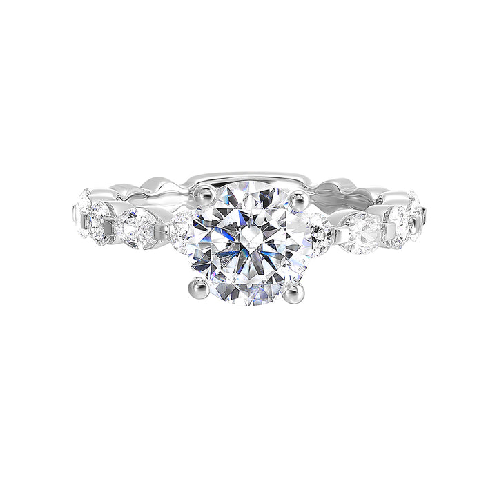 The Marquise and round diamond shank are a modern take on a classic look adding elegance and excitement to your look with bigger center diamond.