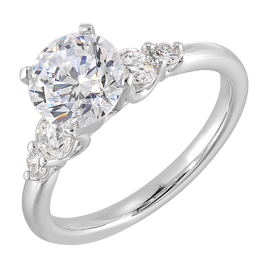 Five times diamonds for five times sparkles. A classic, lustrous band completes the look of this five stone engagement ring.