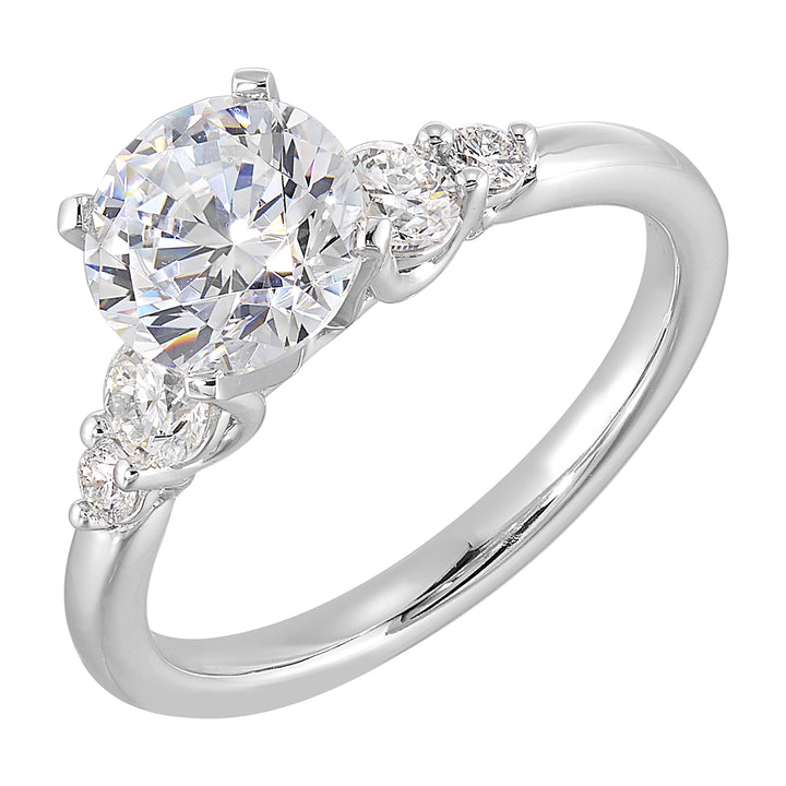Five times diamonds for five times sparkles. A classic, lustrous band completes the look of this five stone engagement ring.