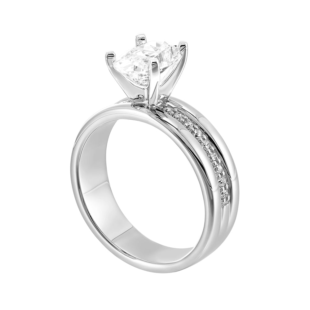 Make a luxurious presence with bold wide engagement ring. This modern engagement ring with oval center features a thick band with studded diamonds in center that makes an eye-catching statement .