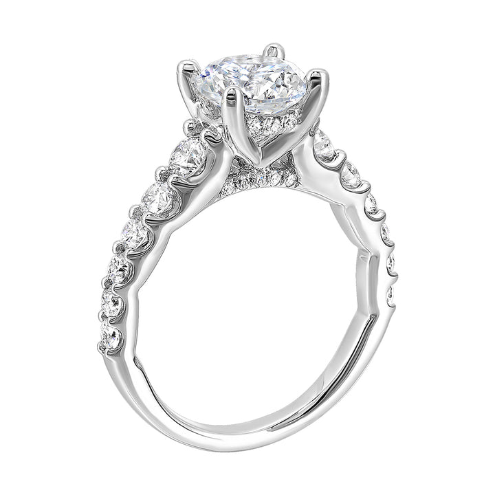 Dazzle with this gorgeous engagement ring featuring a round diamond center.  The shank is graduated with large round diamonds, set in shared prongs.