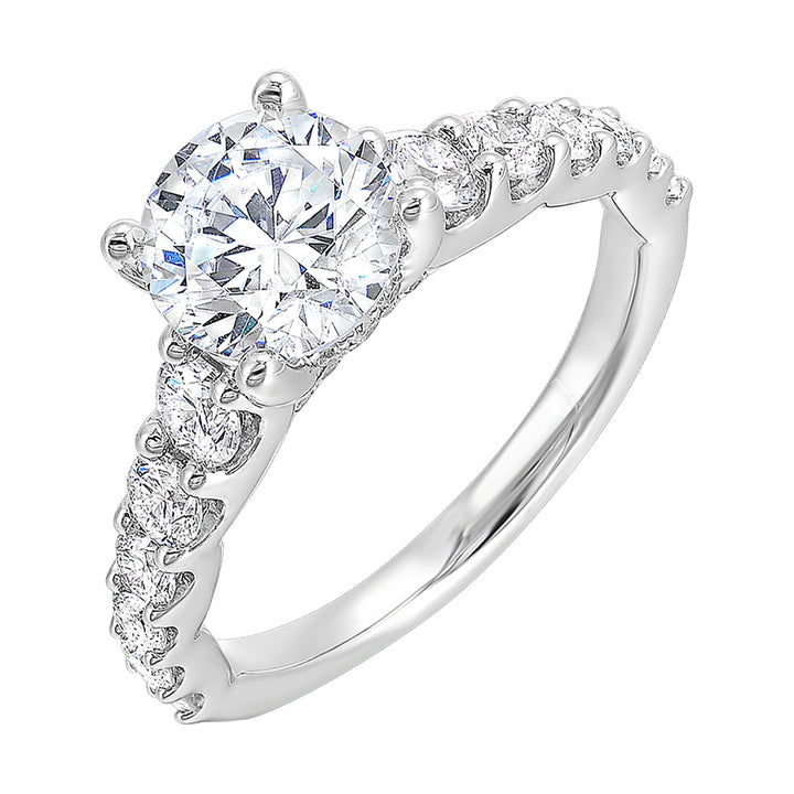 Dazzle with this gorgeous engagement ring featuring a round diamond center.  The shank is graduated with large round diamonds, set in shared prongs.