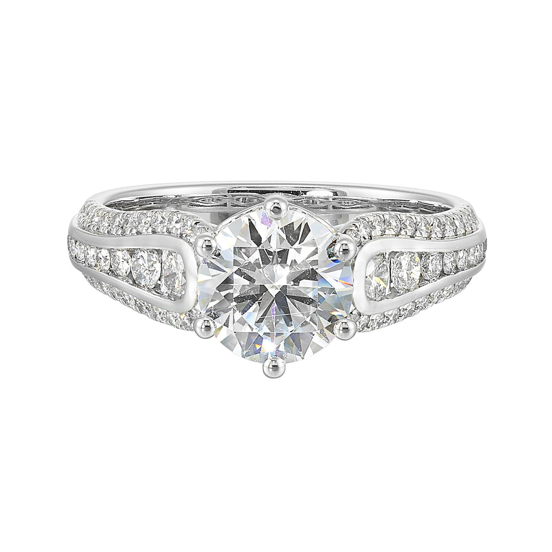 Stunning solitaire ring set in 6 prongs is a dazzling display of channel set diamonds in the center & pave on sides making the ring more appealing.