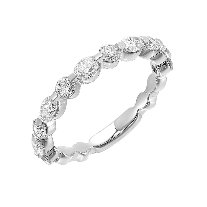 Fancy marquise and round diamonds take center stage, playfully set in a single prong look on this band with comfort fit inside.