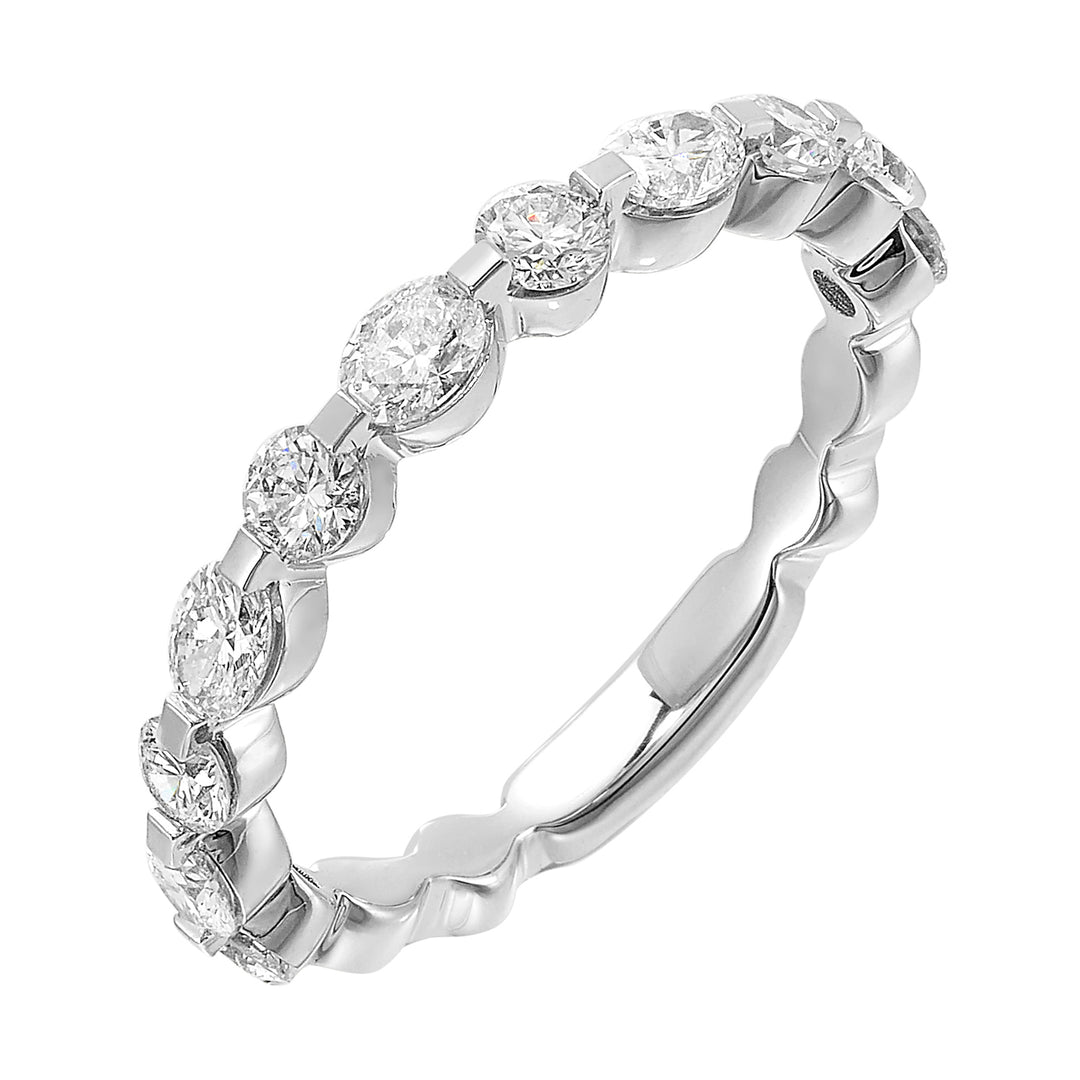 Fancy marquise and round diamonds take center stage,  playfully set in a single prong look on this band with comfort fit inside.